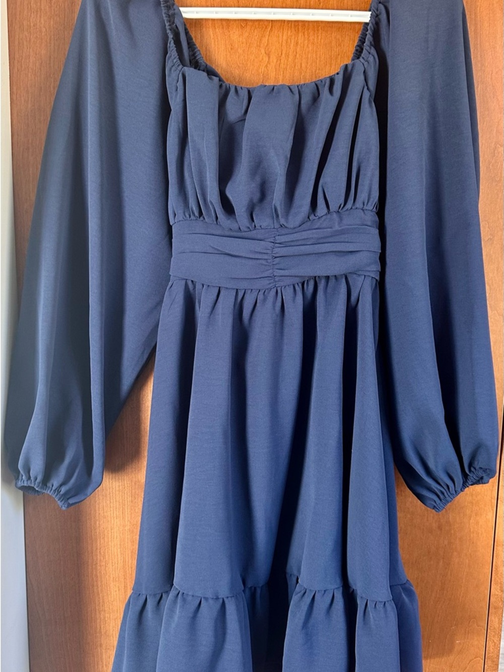 SHEIN navy blue women's garment with branded label